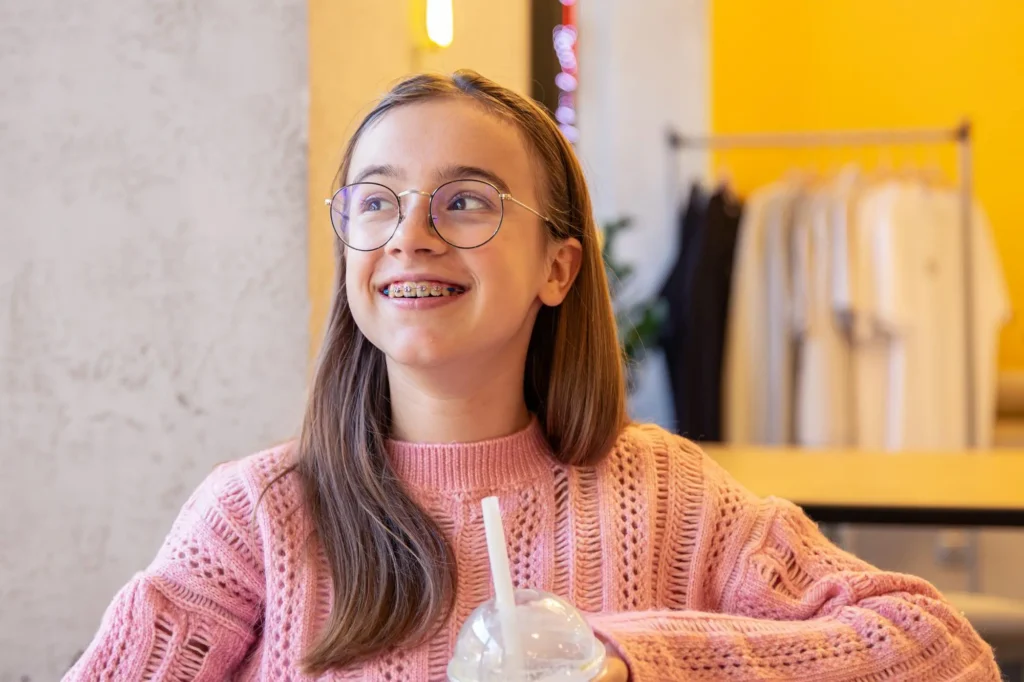 Smiling teen with braces