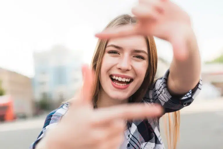 Smiling teen showing off her teeth