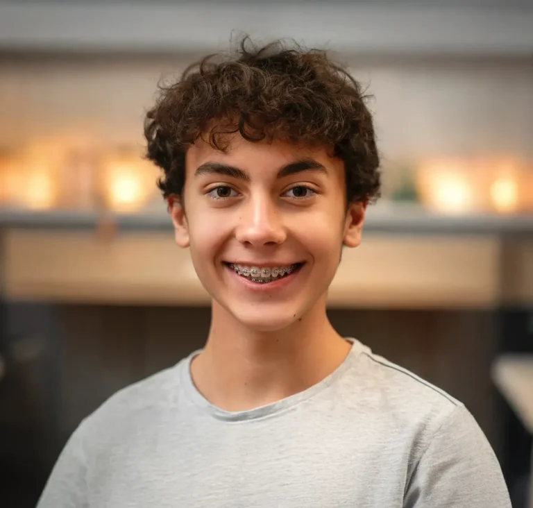 Smiling teen boy with braces