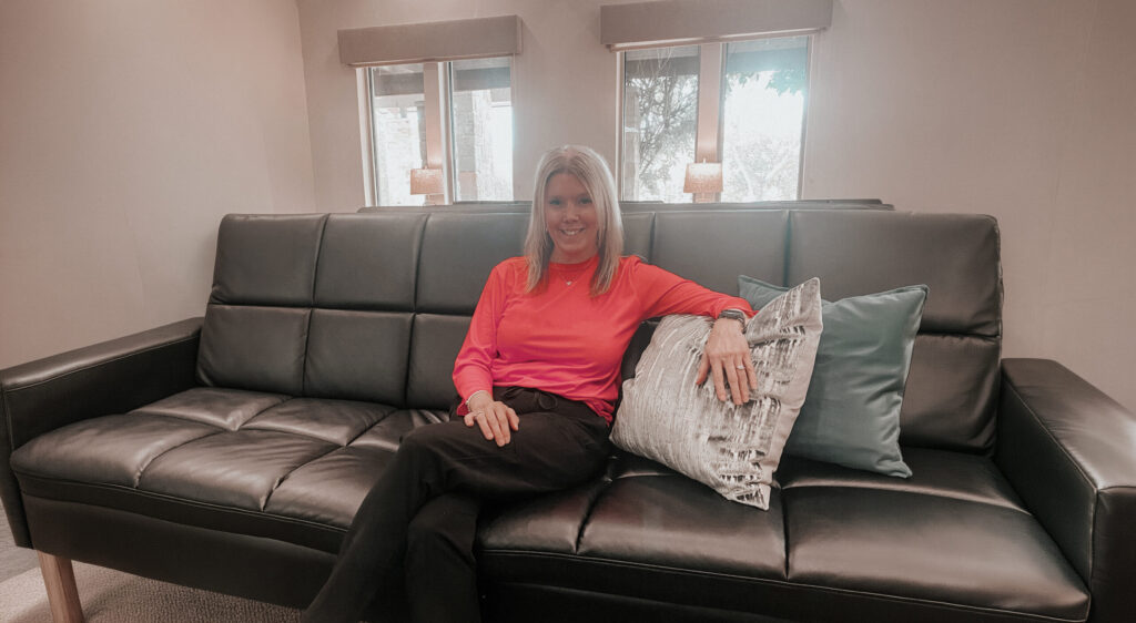 Dr Stokes Sitting On Leather Sofa