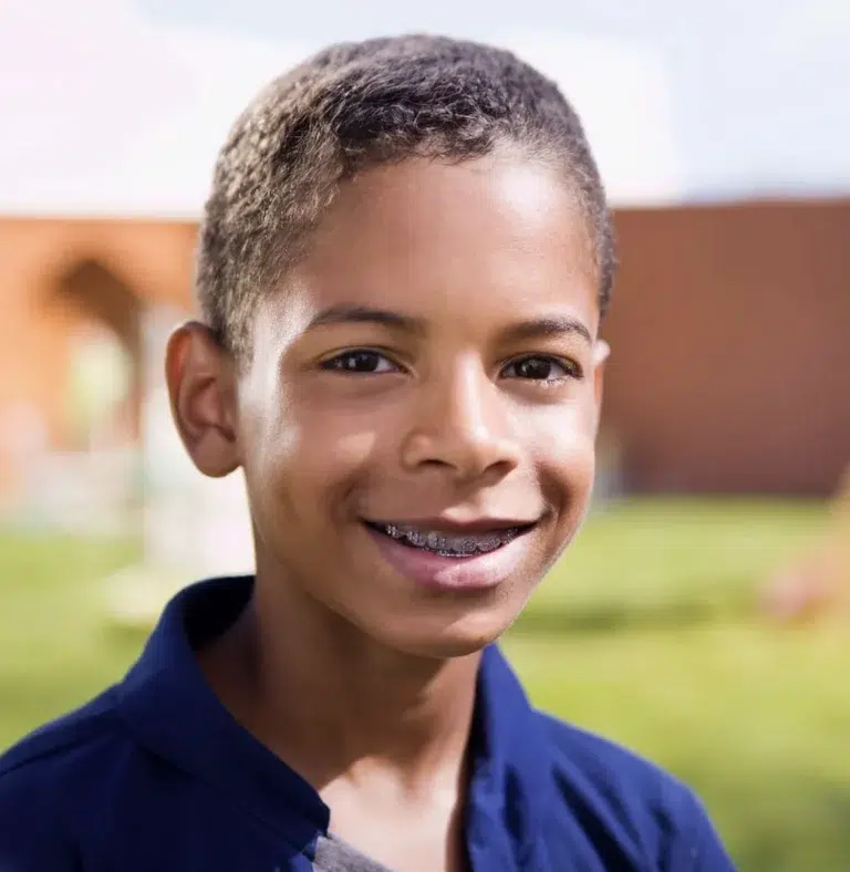 Young Boy With Braces Smiling